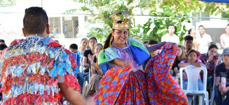 Two people doing a traditional Panamanian dance