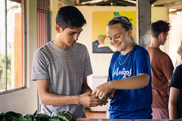 Volunteers making tamales