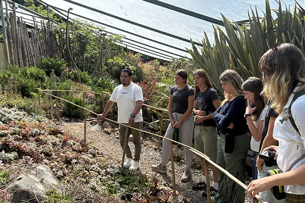 Volunteers learning from local organization