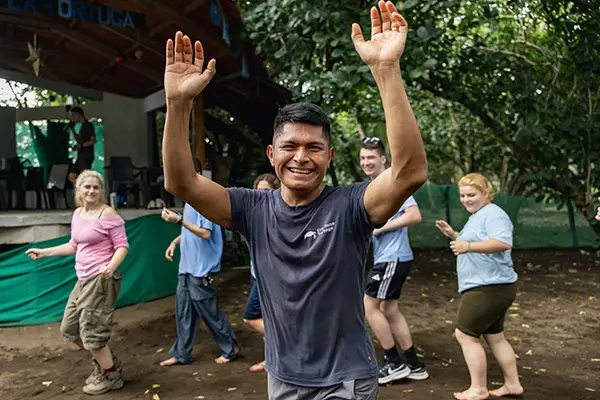 Volunteers learning local dance