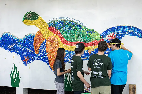 Volunteers making mural in local organization