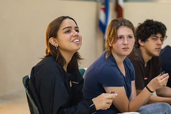 Local youth and AMIGOS volunteer during an activity