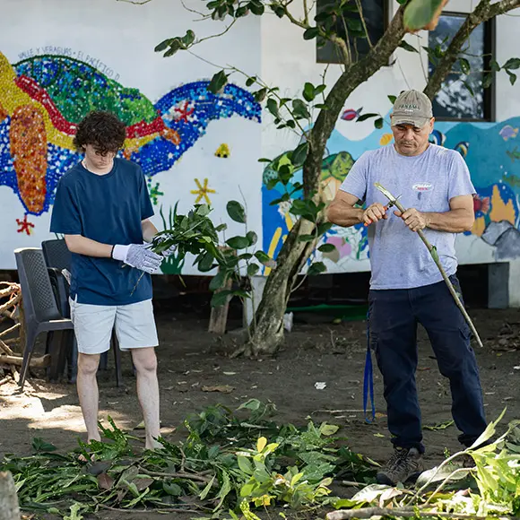 Volunteers collaborate with local organizations in service work