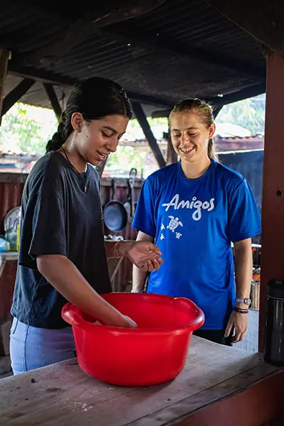 AMIGOS volunteers preparing Costa Rican food