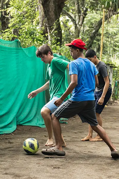 Play soccer with local yotuh
