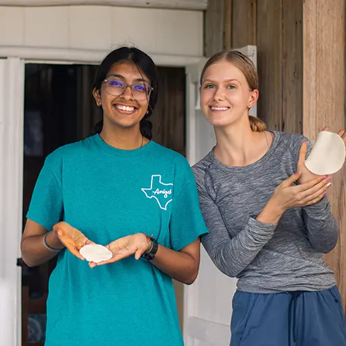 Volunteers making tortillas
