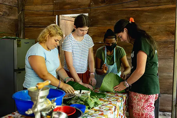 Volunteers making tamales