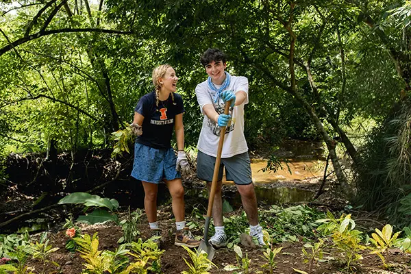 Volunteers doing reforestation service work