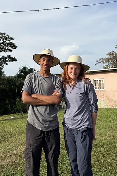 Volunteers with traditional hats