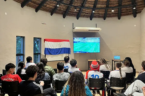 Volunteers watching a Paraguay soccer match during the World Cup