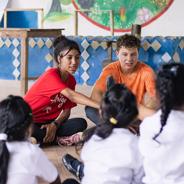 Volunteers lead activities with local kids