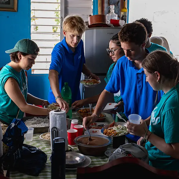 Volunteers enjoying a meal